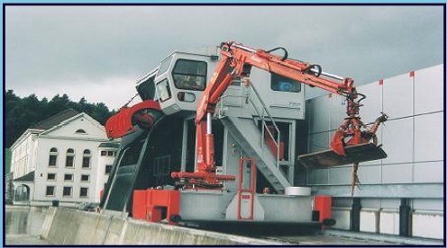 Amco Veba crane with a grab on a fixed installation